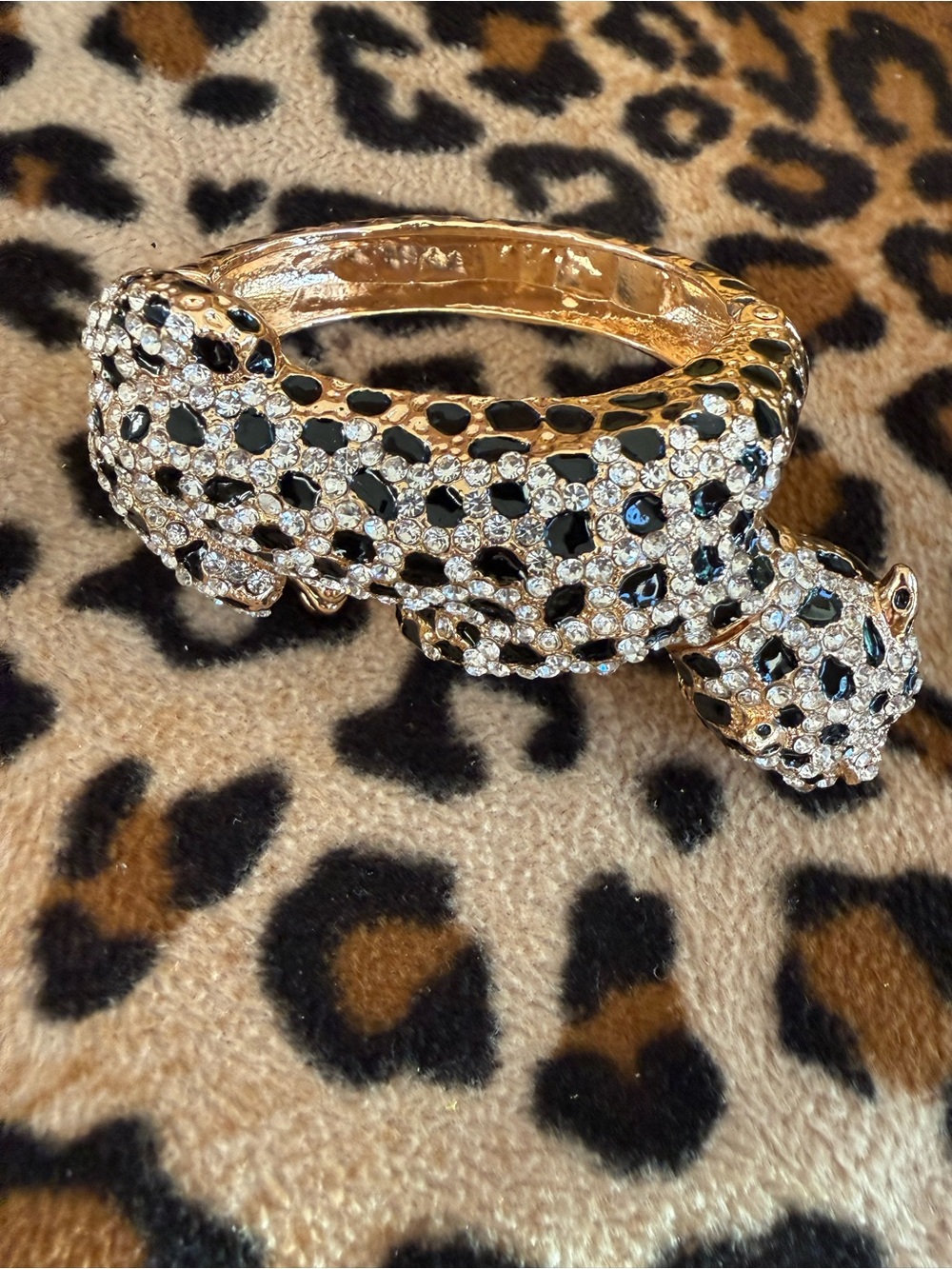 Gold – tone, rhinestone, and enamel, leopard clamper bracelet